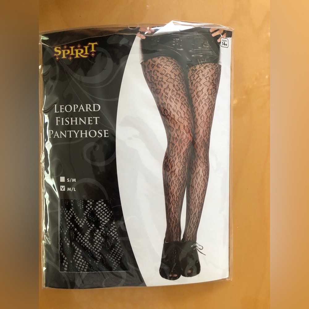 Fishnet tights brand new in animal print